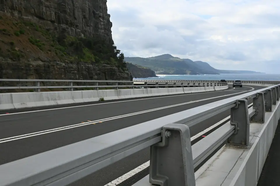 Sea Cliff Bridge curving over the ocean near Sydney